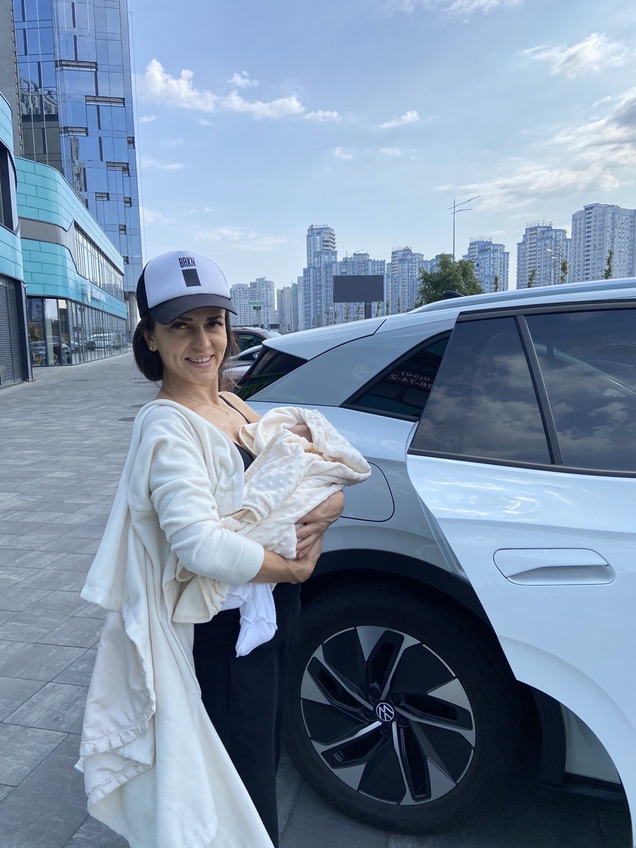 Mary Mo / Marina Strikha with her child
